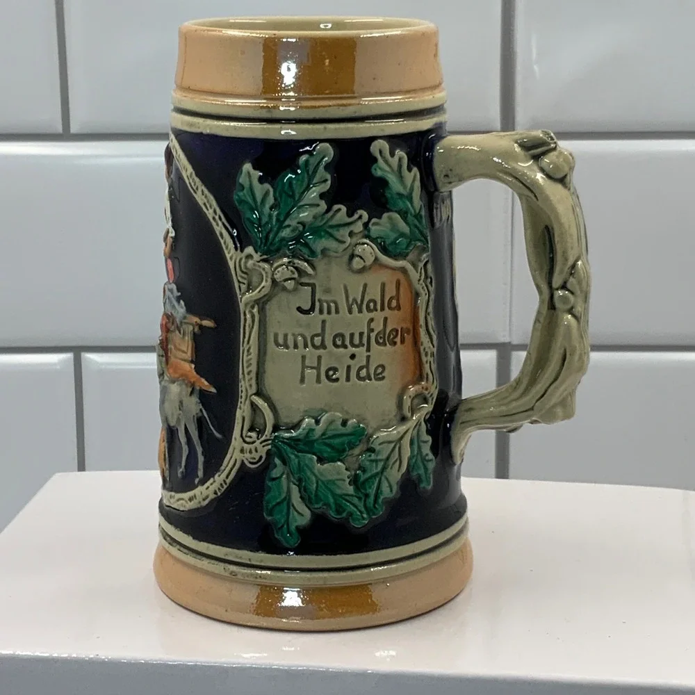 Vintage Western Germany Beer Stein Hunter Scene Ceramic Mug Cobalt Blue Relief